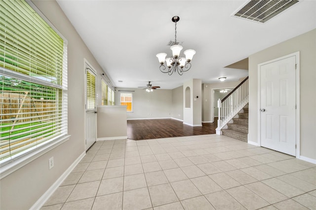 32126 Willow Creek Park, Conroe, TX 77385 - tiled entryway with a chandelier, ceiling fan, and stairway