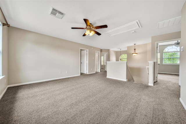 32126 Willow Creek Park, Conroe, TX 77385 - empty room with attic access, carpet flooring, and ceiling fan