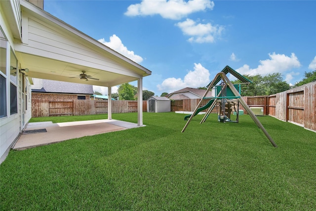 32126 Willow Creek Park, Conroe, TX 77385 - fenced backyard with a storage shed, a patio, a playground, and ceiling fan