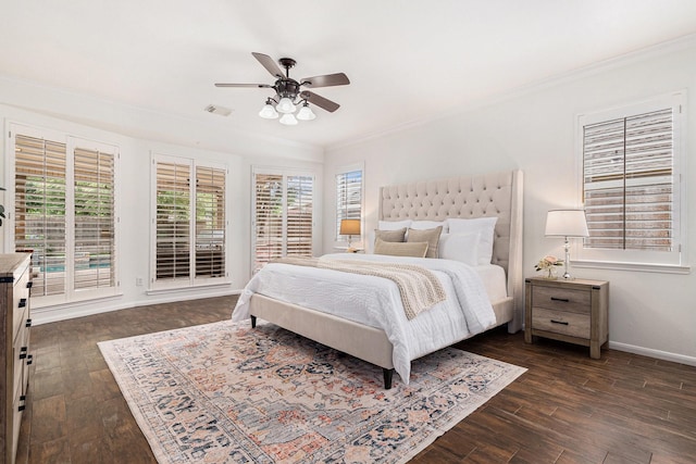 15814 Lake Loop Dr, Cypress, TX 77433 - bedroom with ornamental molding, dark wood finished floors, and ceiling fan