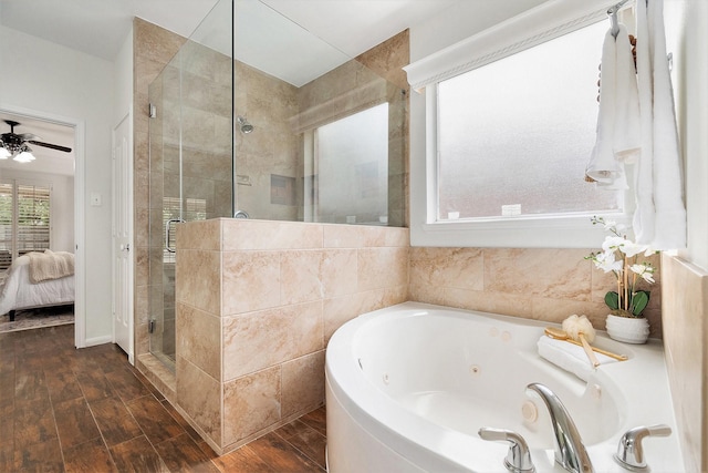 15814 Lake Loop Dr, Cypress, TX 77433 - ensuite bathroom featuring a stall shower, a tub with jets, wood finished floors, and ceiling fan