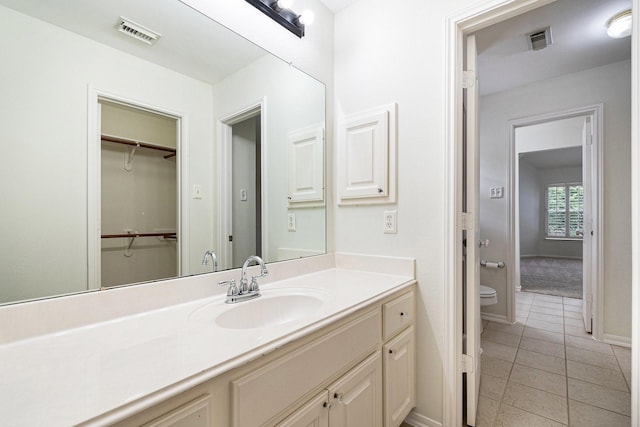 15814 Lake Loop Dr, Cypress, TX 77433 - bathroom featuring vanity and tile patterned flooring