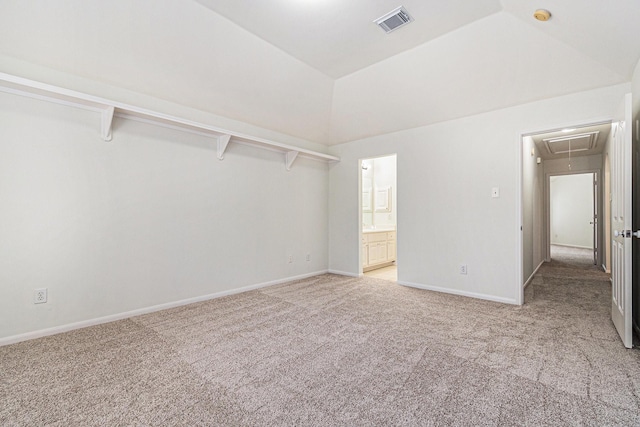 15814 Lake Loop Dr, Cypress, TX 77433 - unfurnished bedroom with attic access, light carpet, vaulted ceiling, and connected bathroom
