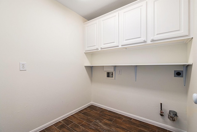 15814 Lake Loop Dr, Cypress, TX 77433 - washroom with hookup for an electric dryer, washer hookup, dark wood-style floors, hookup for a gas dryer, and cabinet space