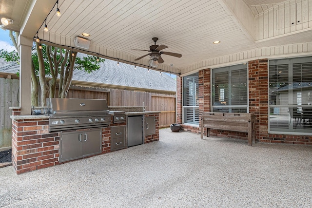 15814 Lake Loop Dr, Cypress, TX 77433 - view of patio / terrace featuring exterior kitchen and a ceiling fan