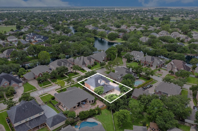 15814 Lake Loop Dr, Cypress, TX 77433 - aerial perspective of suburban area featuring property boundaries highlighted and a nearby body of water