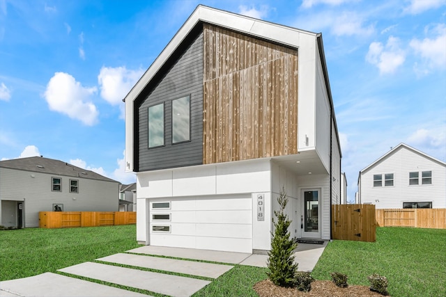 4024 Boho Ln, Houston, TX 77045 - contemporary home featuring a garage