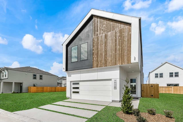 4024 Boho Ln, Houston, TX 77045 - contemporary house featuring a garage