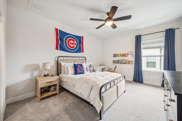 11011 Heartleaf Aster Way, Cypress, TX 77433 - bedroom with light carpet, baseboards, and ceiling fan