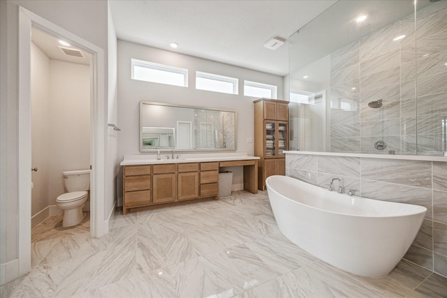 11011 Heartleaf Aster Way, Cypress, TX 77433 - full bath with tiled shower, vanity, marble finish floors, a freestanding tub, and toilet