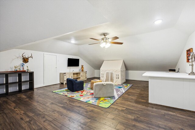 711 S Tesch St, Bellville, TX 77418 - bonus room with vaulted ceiling, wood finished floors, a ceiling fan, and baseboards