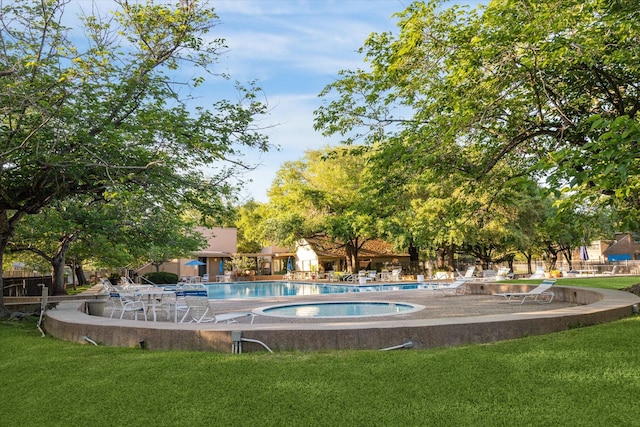 1433 Chardonnay Dr, Houston, TX 77077 - community pool featuring a lawn and a patio