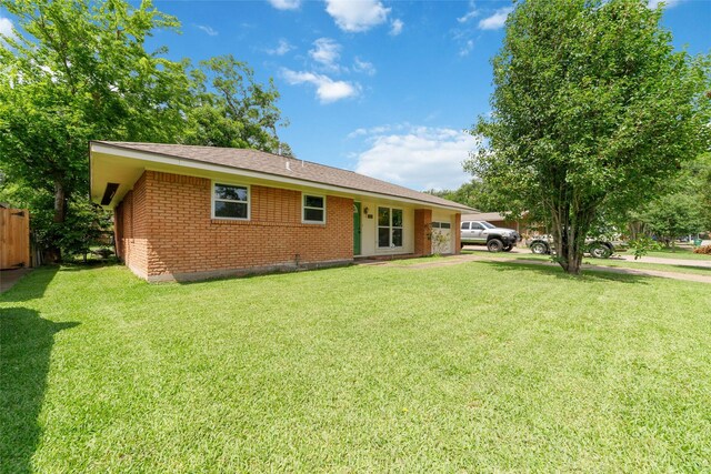 6601 Roos Rd, Houston, TX 77074 - view of front of house with brick siding