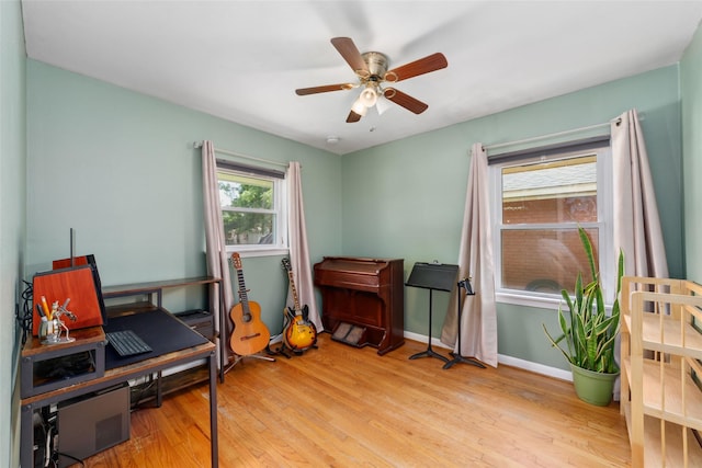 6601 Roos Rd, Houston, TX 77074 - home office with wood finished floors, ceiling fan, and baseboards