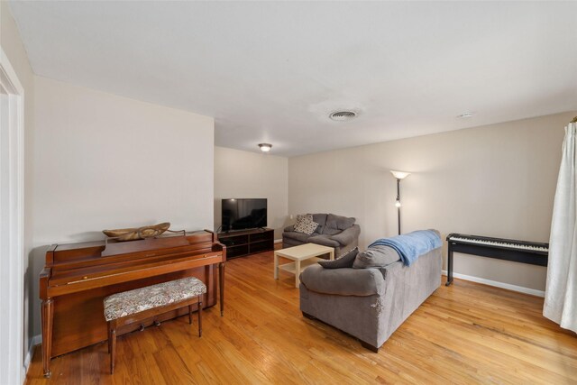 6601 Roos Rd, Houston, TX 77074 - living room with light wood-style flooring
