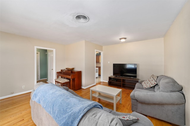 6601 Roos Rd, Houston, TX 77074 - living room with light wood-style floors and baseboards