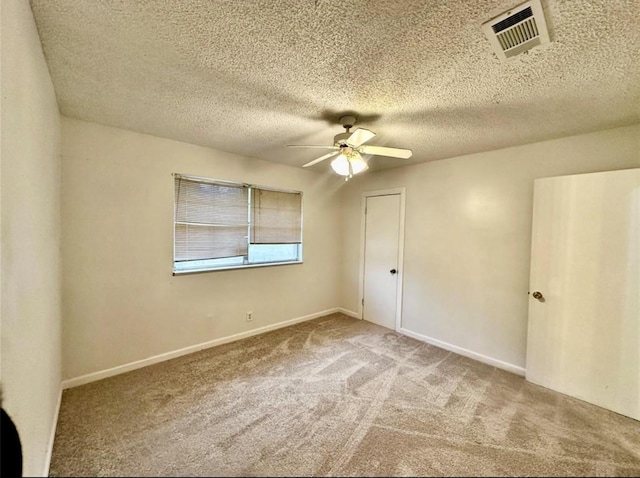 1008 Brockman St, Sweeny, TX 77480 - carpeted spare room featuring a ceiling fan, a textured ceiling, and baseboards