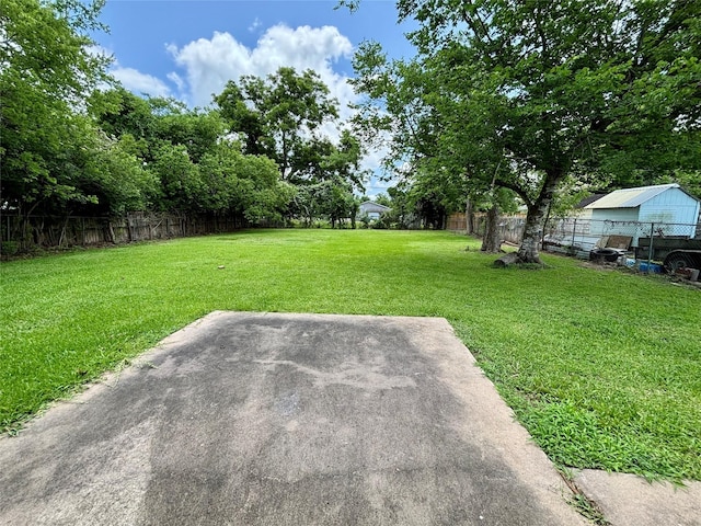 1008 Brockman St, Sweeny, TX 77480 - view of yard with a patio area