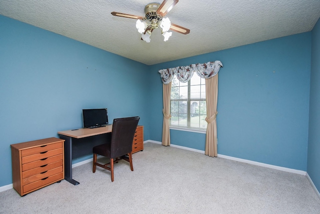 1610 Chapelwood Ln, Richmond, TX 77406 - carpeted home office with a ceiling fan, a textured ceiling, and baseboards