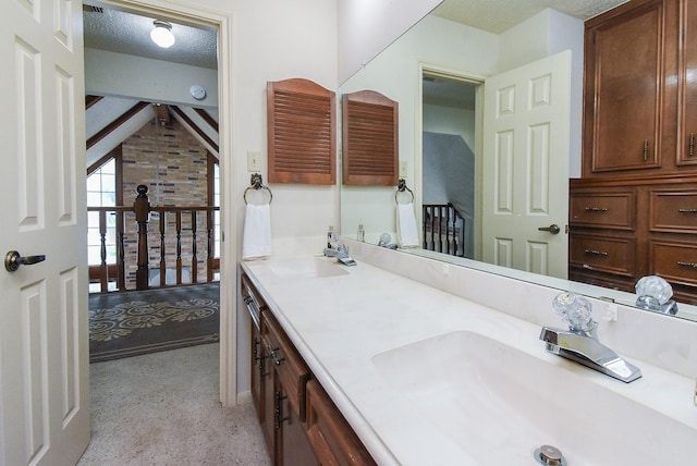 1610 Chapelwood Ln, Richmond, TX 77406 - bathroom with double vanity and a textured ceiling