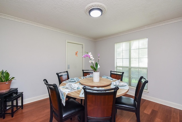 1610 Chapelwood Ln, Richmond, TX 77406 - dining area with dark wood-style floors, ornamental molding, baseboards, and a textured ceiling