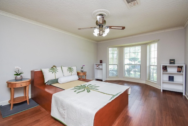1610 Chapelwood Ln, Richmond, TX 77406 - bedroom featuring wood finished floors, baseboards, ornamental molding, a textured ceiling, and ceiling fan