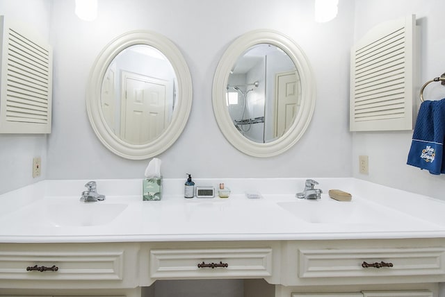 1610 Chapelwood Ln, Richmond, TX 77406 - bathroom featuring double vanity and a shower