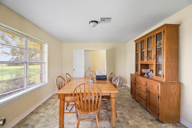 11221 State Highway 65, Winnie, TX 77665 - dining area with baseboards