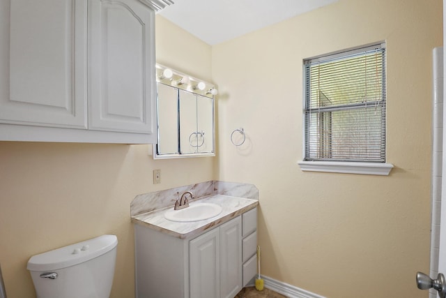 11221 State Highway 65, Winnie, TX 77665 - bathroom with vanity and toilet
