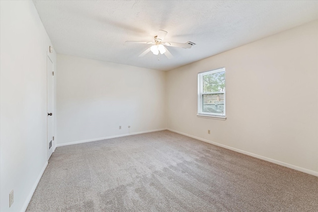 5218 Springton Ln, Spring, TX 77379 - empty room with a ceiling fan, carpet floors, and baseboards