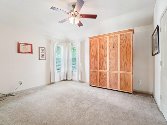 1003 Commons Waterway Dr, Huffman, TX 77336 - unfurnished bedroom featuring carpet floors and a ceiling fan