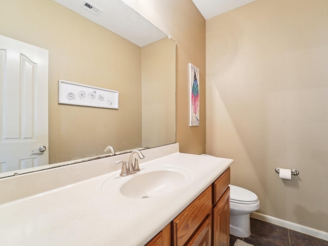 1003 Commons Waterway Dr, Huffman, TX 77336 - bathroom featuring toilet, vanity, and tile patterned flooring