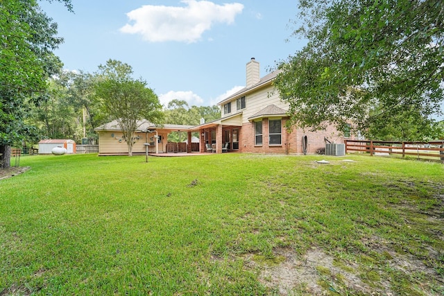 1003 Commons Waterway Dr, Huffman, TX 77336 - view of yard featuring central AC