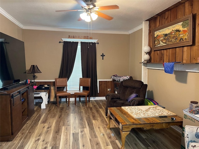 120 N 10th Ave, Teague, TX 75860 - living room with a ceiling fan, ornamental molding, and wood finished floors