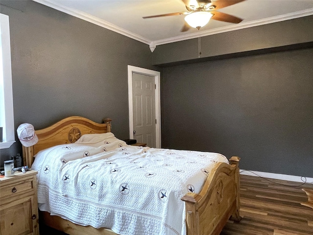 120 N 10th Ave, Teague, TX 75860 - bedroom with ornamental molding, wood finished floors, a ceiling fan, and baseboards