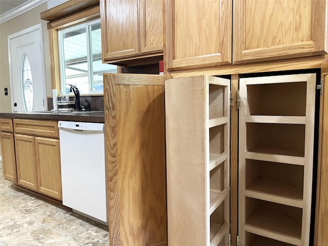 120 N 10th Ave, Teague, TX 75860 - kitchen with white dishwasher, a sink, light brown cabinetry, dark countertops, and crown molding