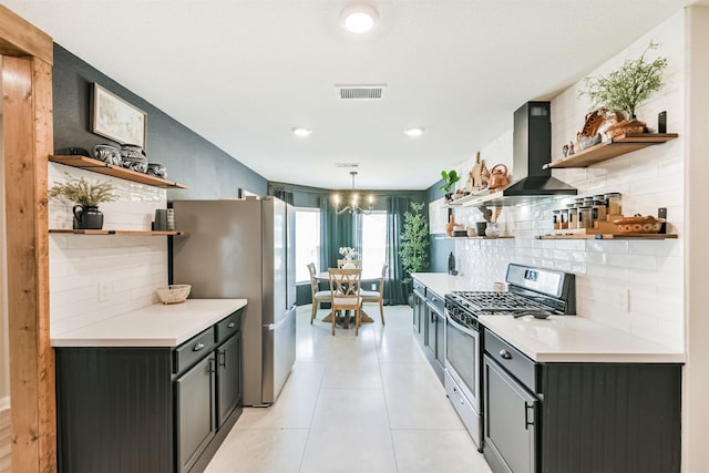 21100 Titian Dr, Magnolia, TX 77355 - kitchen with open shelves, appliances with stainless steel finishes, backsplash, and island exhaust hood