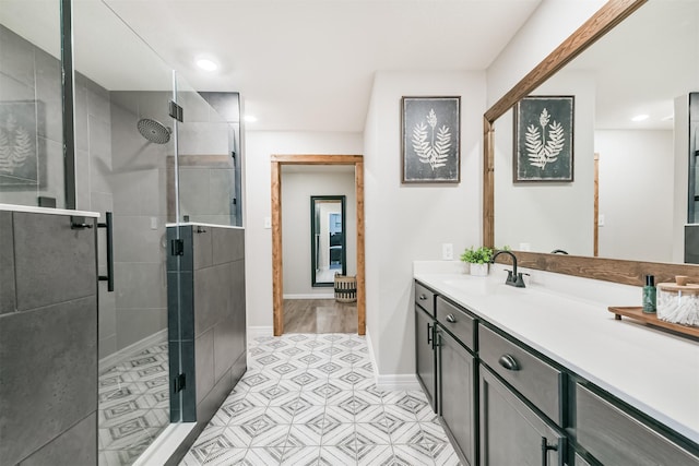 21100 Titian Dr, Magnolia, TX 77355 - bathroom featuring vanity, a shower stall, baseboards, and recessed lighting
