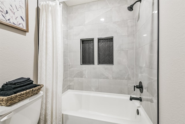 21100 Titian Dr, Magnolia, TX 77355 - full bathroom with shower / bathtub combination with curtain, toilet, and a textured wall