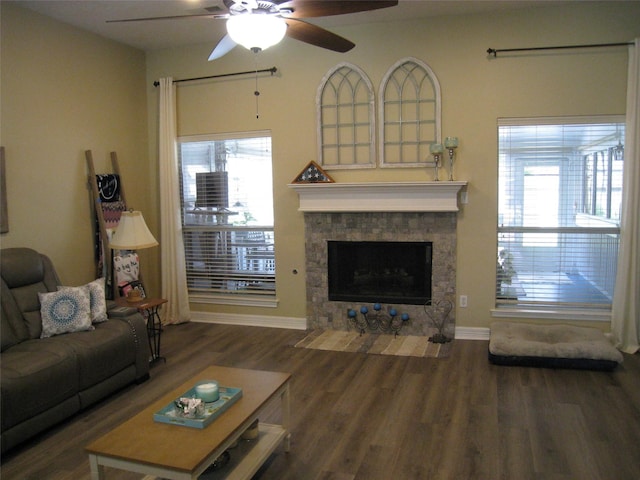 115 Texarkana Dr, Magnolia, TX 77354 - living area with wood finished floors, a ceiling fan, healthy amount of natural light, and a tile fireplace