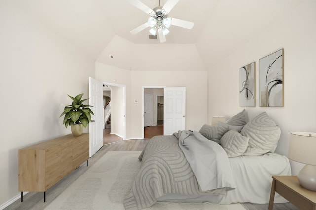 2507 Abernathy Glen Ct, Houston, TX 77014 - bedroom with wood finished floors, ceiling fan, and a spacious closet