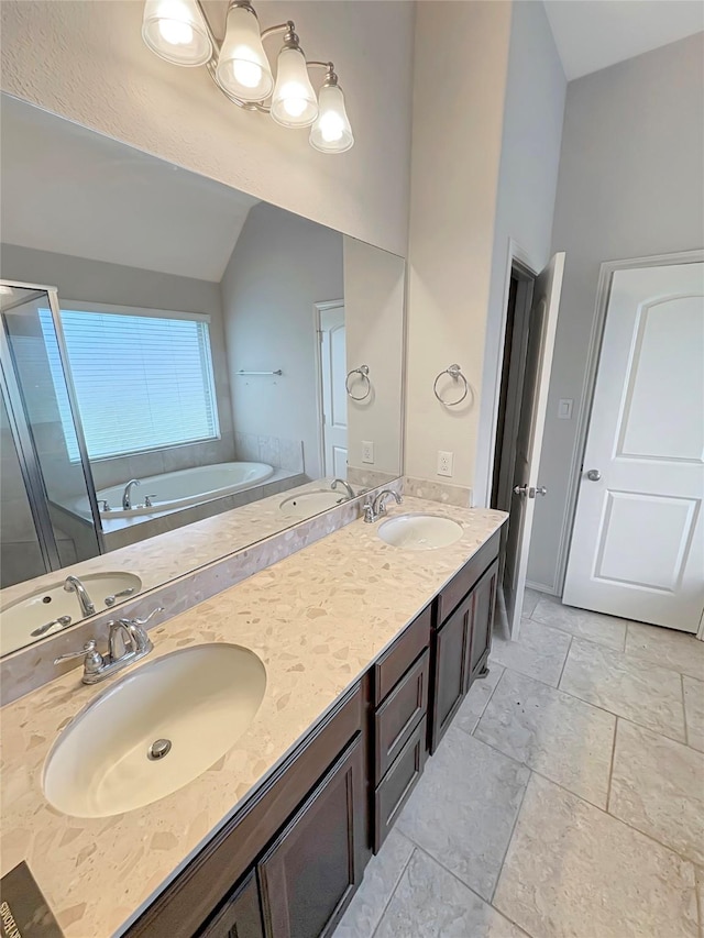 3328 Primrose Canyon Ln, Pearland, TX 77584 - bathroom featuring a bath, double vanity, a shower stall, and high vaulted ceiling