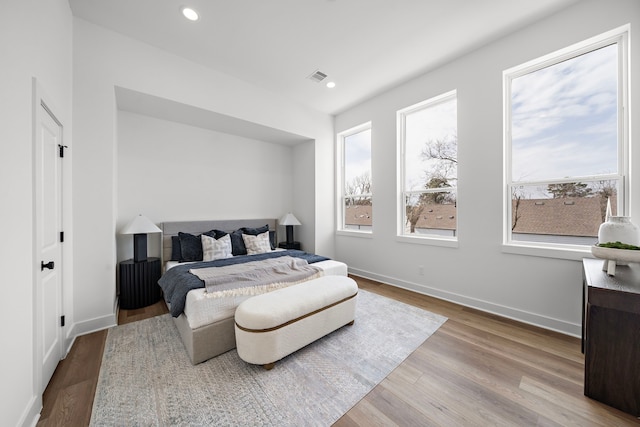 835 Rachel St Unit C, Houston, TX 77091 - bedroom featuring wood finished floors, baseboards, and recessed lighting