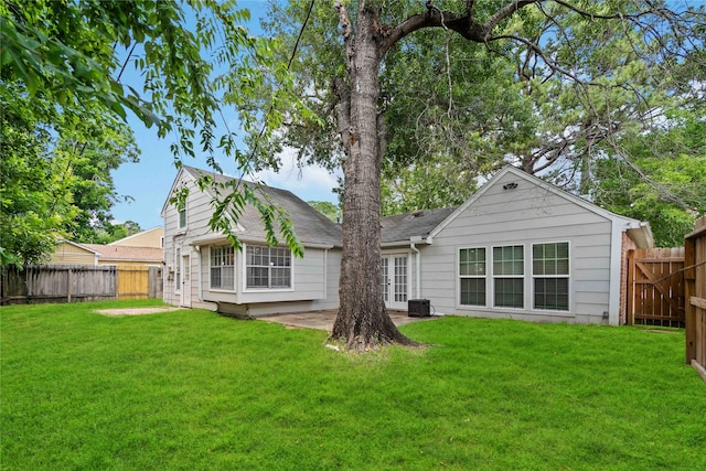 10503 Windriver Dr, Houston, TX 77070 - rear view of house with a patio area and central air condition unit