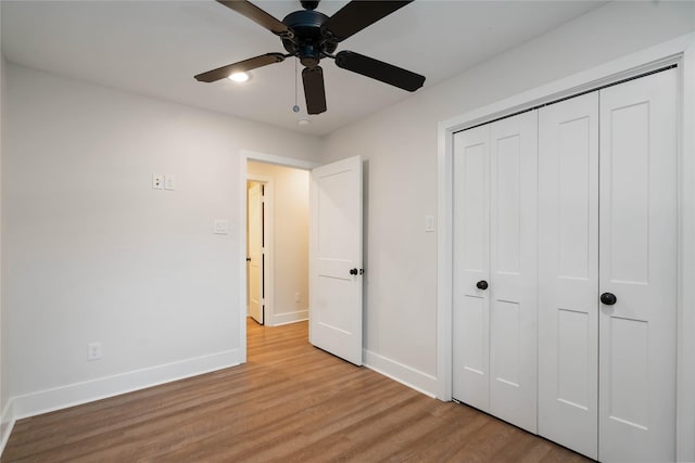 10503 Windriver Dr, Houston, TX 77070 - unfurnished bedroom with baseboards, wood finished floors, a closet, ceiling fan, and recessed lighting
