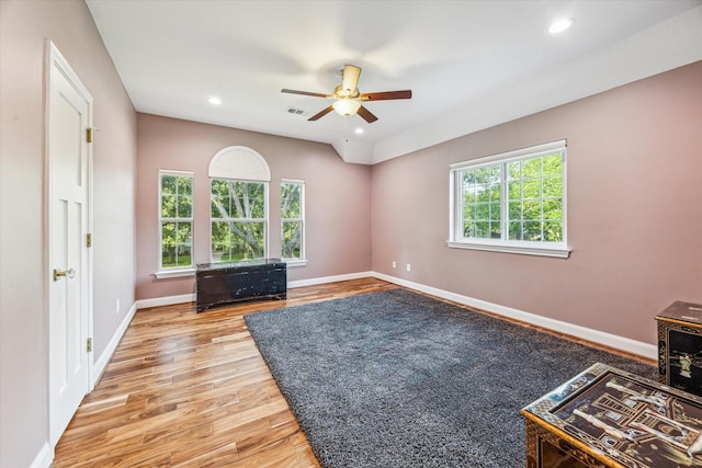 22111 Blacksburg Ct, Katy, TX 77450 - unfurnished living room with light wood finished floors, a ceiling fan, baseboards, and recessed lighting