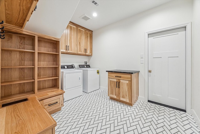 22111 Blacksburg Ct, Katy, TX 77450 - laundry room with washing machine and dryer, baseboards, brick patterned flooring, and cabinet space