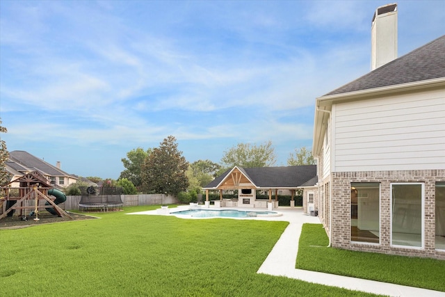 22111 Blacksburg Ct, Katy, TX 77450 - view of yard with a trampoline, a playground, and a patio