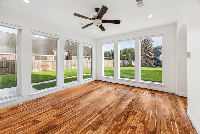 22111 Blacksburg Ct, Katy, TX 77450 - unfurnished sunroom with a ceiling fan and arched walkways