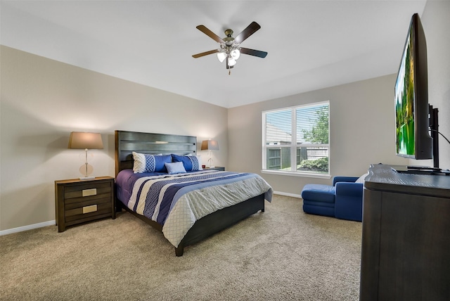 15311 Aboyne Ln, Humble, TX 77346 - bedroom featuring carpet floors, baseboards, and ceiling fan